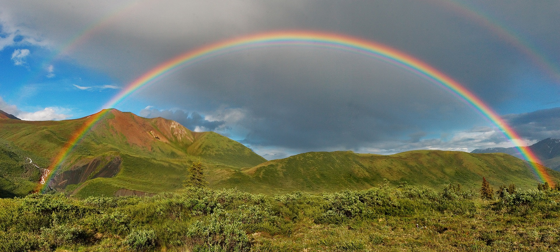 Full featured double rainbow in Wrangell-St. Elias National Park, Alaska Airbrushed (cc-by-sa-2.5). This is a retouched picture by Edg2s. Original picture by Eric Rolph. More details here: https://commons.wikimedia.org/wiki/File:Double-alaskan-rainbow-airbrushed.jpg Full featured double rainbow in Wrangell-St. Elias National Park, Alaska. By Eric Rolph (cc-by-sa-2.5)